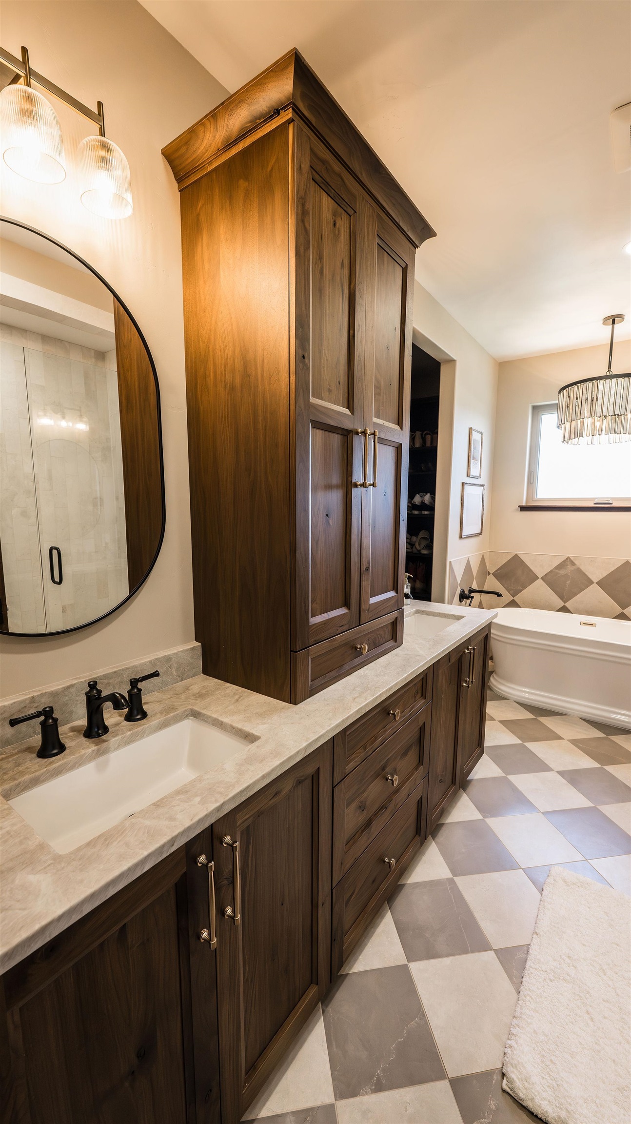 2639 Emerald Ridge Lane Grand Junction, CO 81506 - Photo 15 of 42 a bathroom with a double vanity sink and mirror