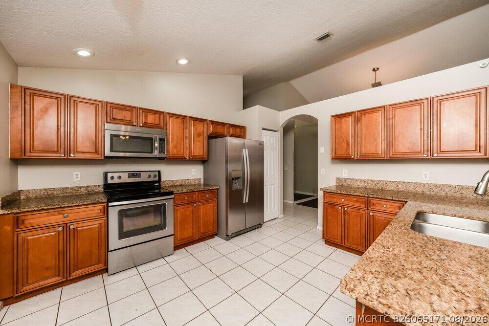 Undisclosed Address Boca Raton, FL 33428 - Photo 6 of 16 07-Kitchen_20260728173047-lg