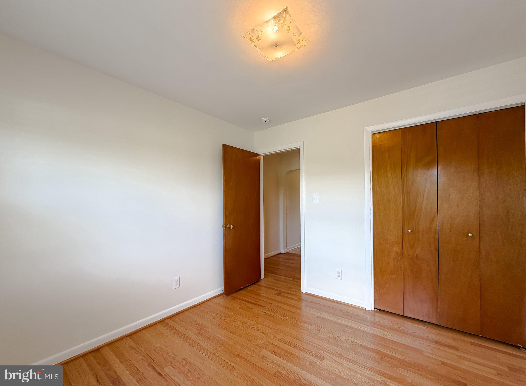23230 Colton Point Road Avenue, MD 20609 - Photo 28 of 63 Bright and airy room with warm tones.