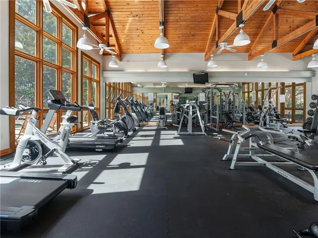 a kitchen with a sink stove and microwave