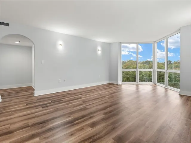 a view of a room with racks on the wall