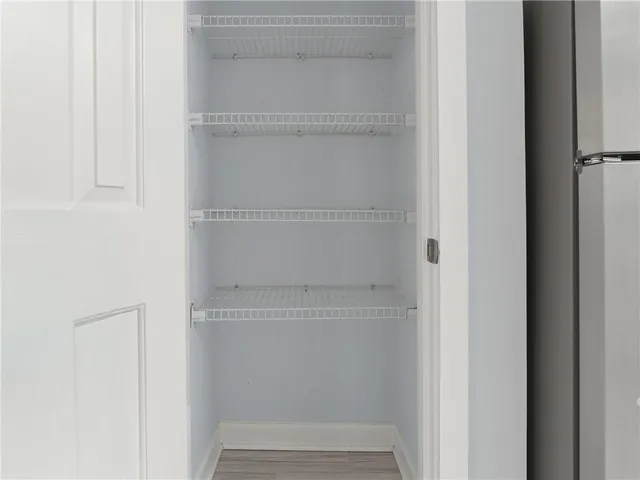 a front view of a building with many windows