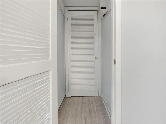 a view of a house with swimming pool and sitting area