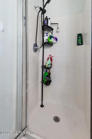 a bath room with a shower