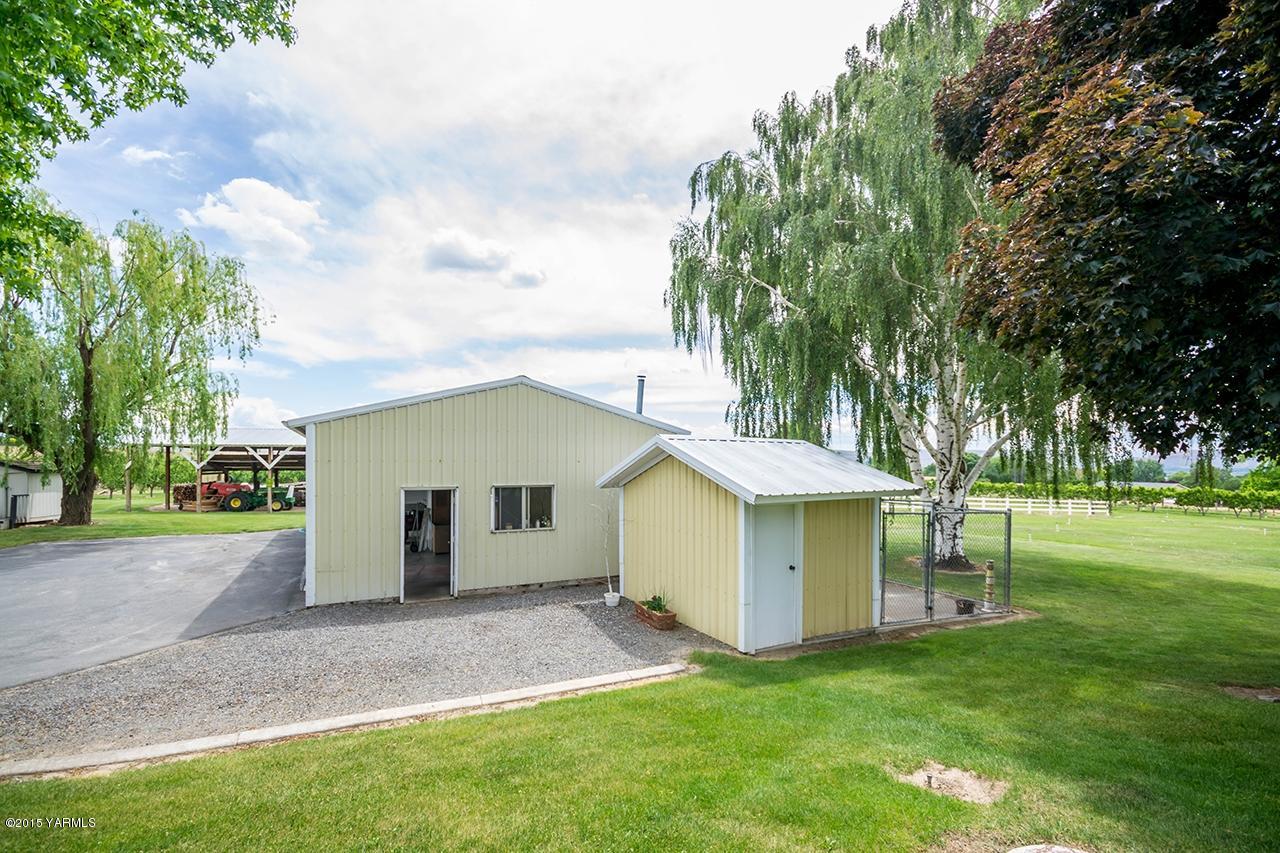 9530 Bittner Road Yakima, WA 98901 - Photo 28 of 28 a view of a house with a yard and tree