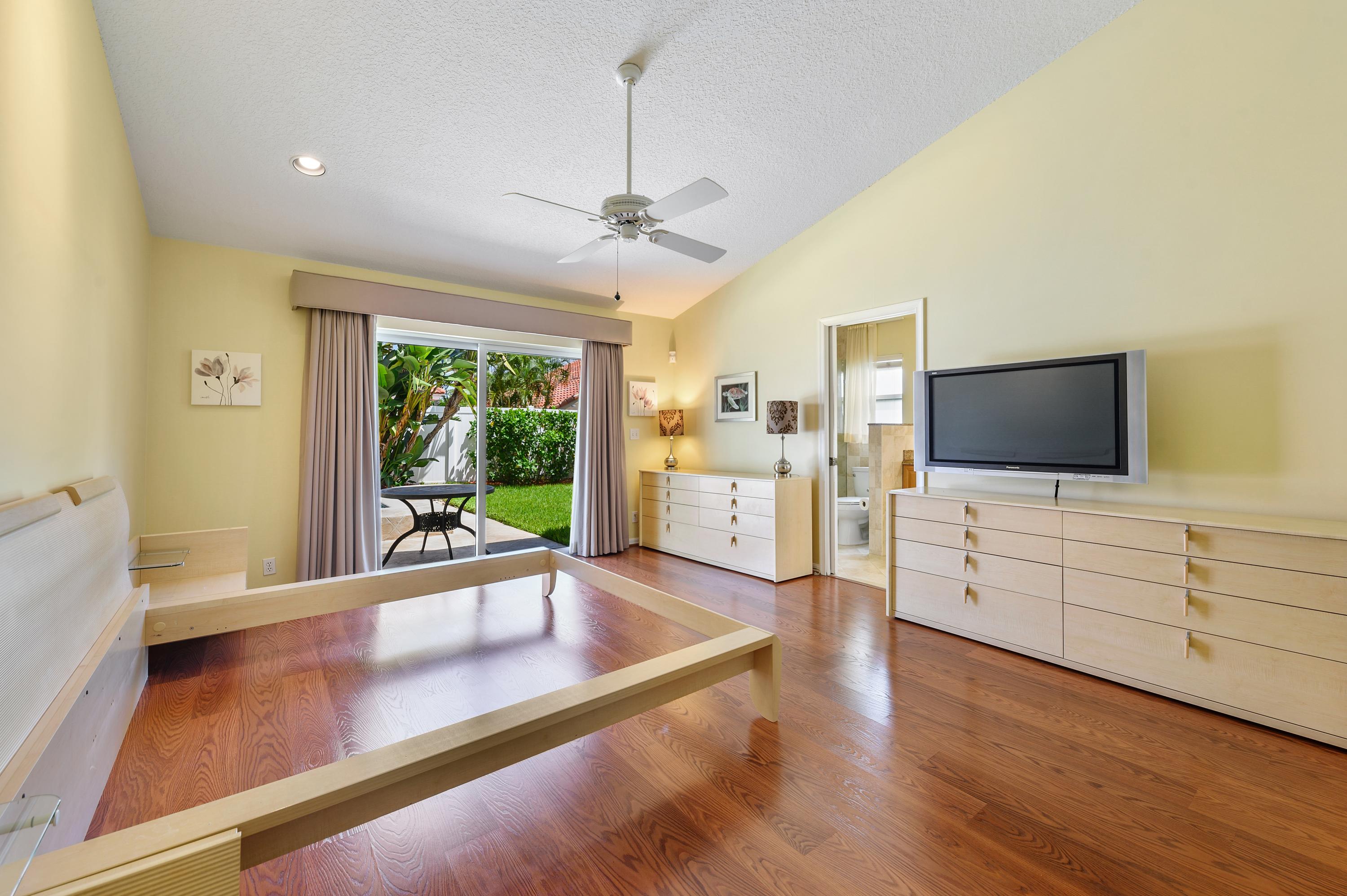 361 Apache Lane Boca Raton, FL 33487 - Photo 7 of 17 07_361ApacheLane_14_PrimaryBedroom_HiRes