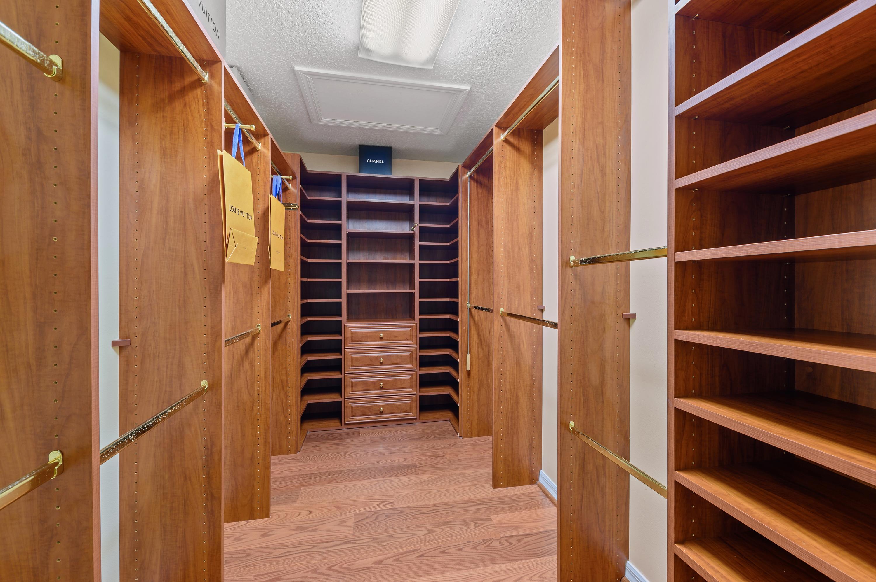361 Apache Lane Boca Raton, FL 33487 - Photo 8 of 17 09_361ApacheLane_45_PrimaryBedroomCloset