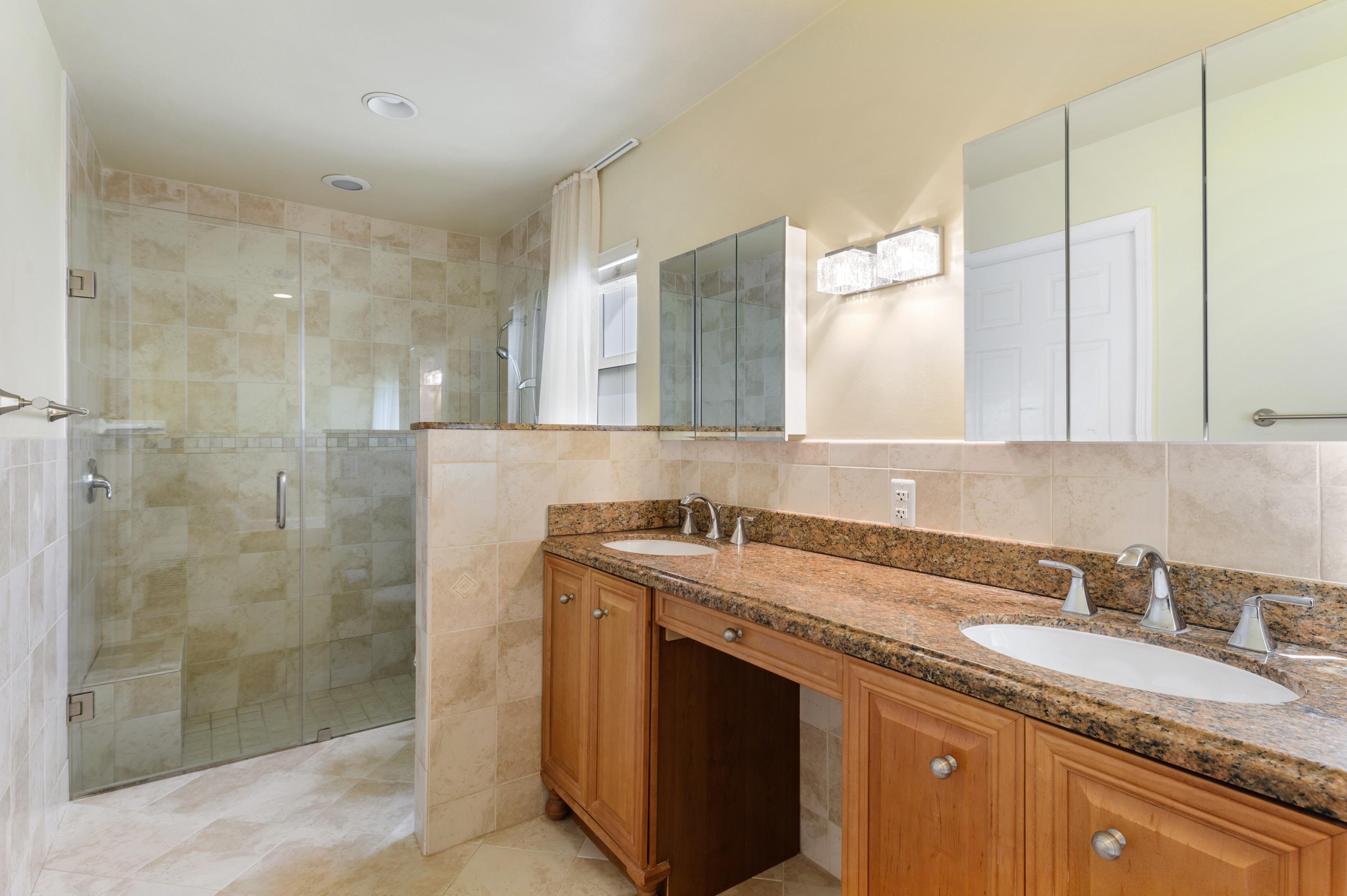 361 Apache Lane Boca Raton, FL 33487 - Photo 9 of 17 08_361ApacheLane_168_PrimaryBathroom_HiR