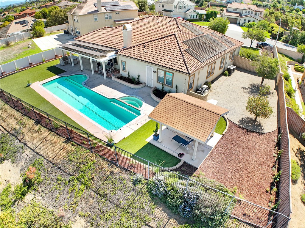 12308 Islesford Circle Riverside, CA 92503 - Photo 1 of 1 an aerial view of a house with a yard