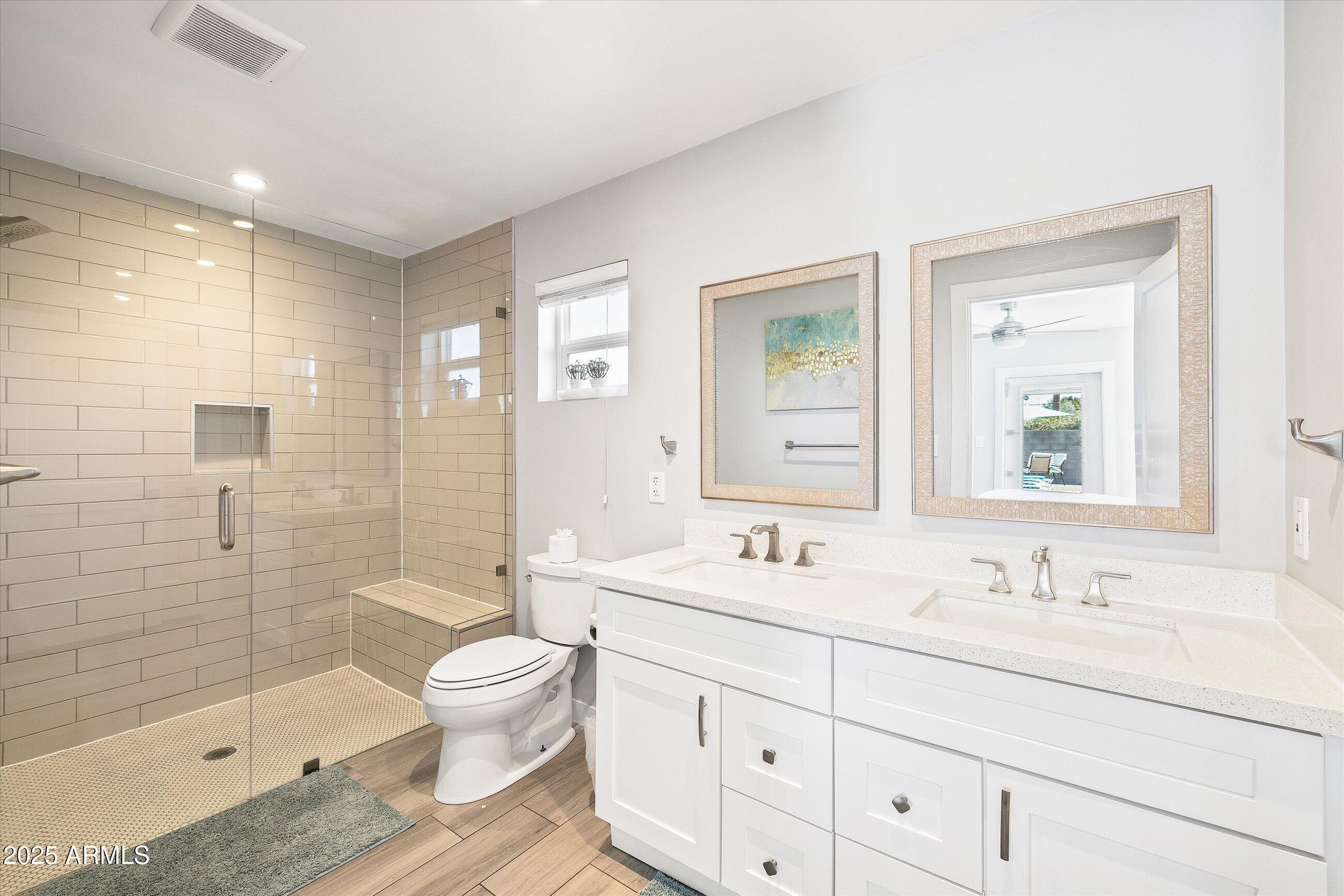 8201 East Piccadilly Road Scottsdale, AZ 85251 - Photo 22 of 26 a bathroom with a sink a toilet and shower