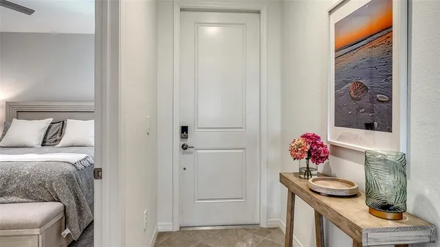 a bathroom with a sink and a mirror with toilet