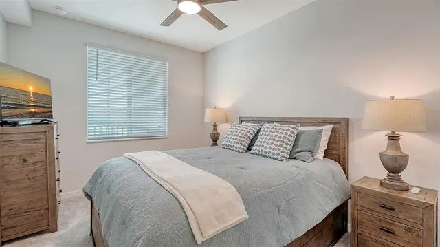 an aerial view of a house with a yard basket ball court