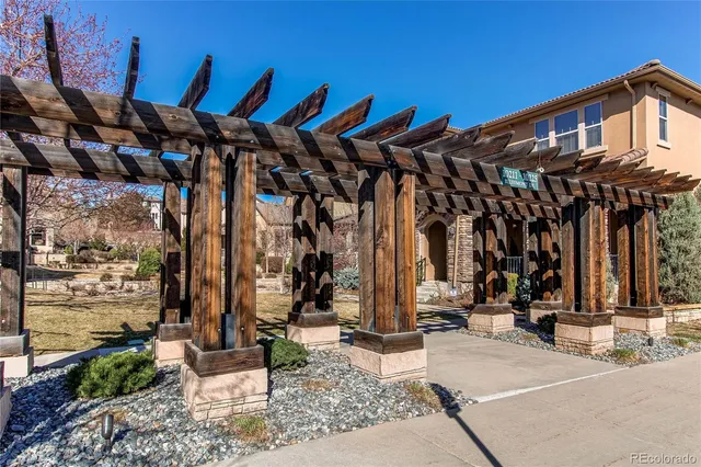a view of a building with sitting area