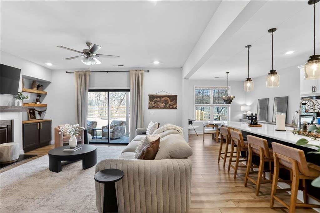 454 Carmichael Circle Canton, GA 30115 - Photo 8 of 30 a living room with furniture and a large window