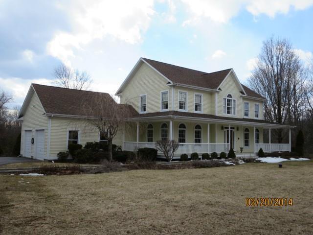 74 Still Road Oxford, CT 06478 - Photo 1 of 1 a front view of a house with a yard