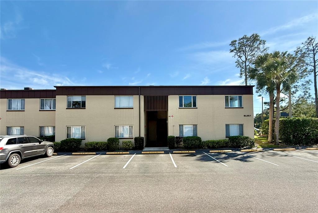 601 North Keene Road, Unit P9 Clearwater, FL 33755 - Photo 1 of 1 a front view of a house with a yard