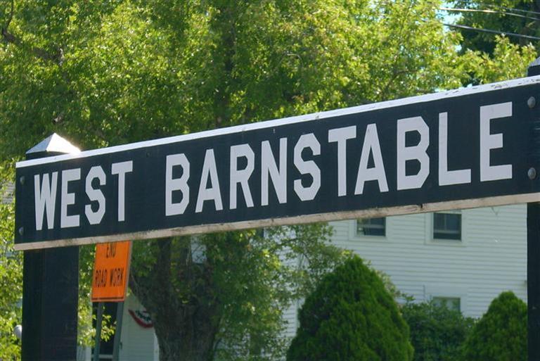1285 Service Road West Barnstable, MA 02668 - Photo 2 of 7 a street sign that is on a pole