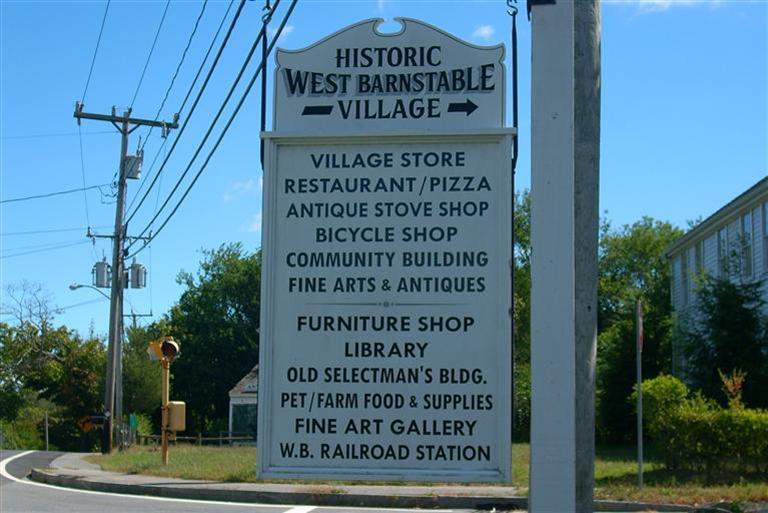 1285 Service Road West Barnstable, MA 02668 - Photo 3 of 7 a sign on the side of a building