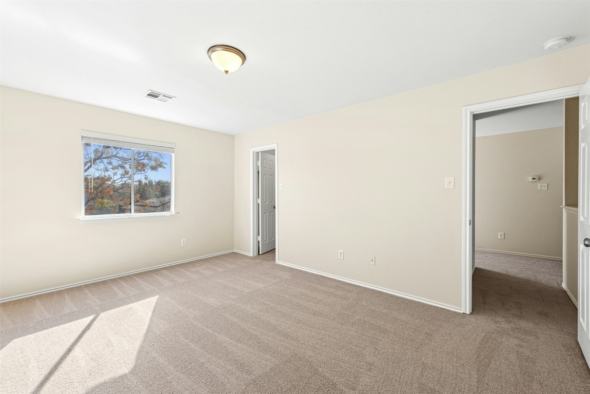 17913 Honey Locust Lane Elgin, TX 78621 - Photo 18 of 31 a view of an empty room with a window