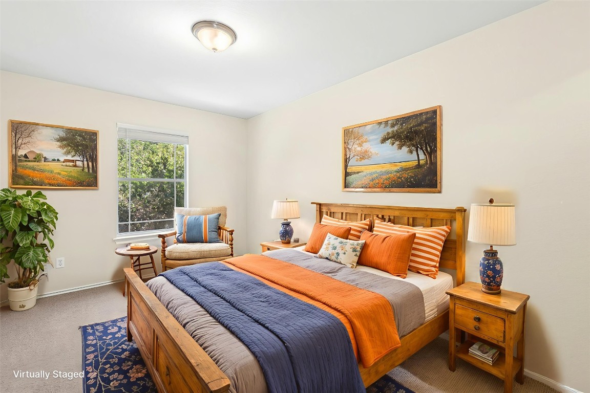 17913 Honey Locust Lane Elgin, TX 78621 - Photo 25 of 31 a bedroom with bed and window