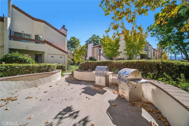 a view of a patio with a chairs in a patio