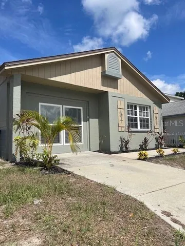 a front view of a house with a patio