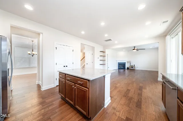 a view of kitchen with wooden floor