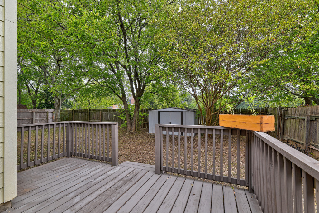 6002 Baton Rouge Drive Austin, TX 78727 - Photo 17 of 20 Rear deck with vertical baluster railing