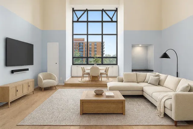 a living room with furniture or couch and a flat screen tv
