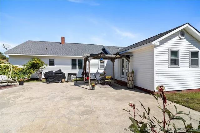 a view of a house with patio