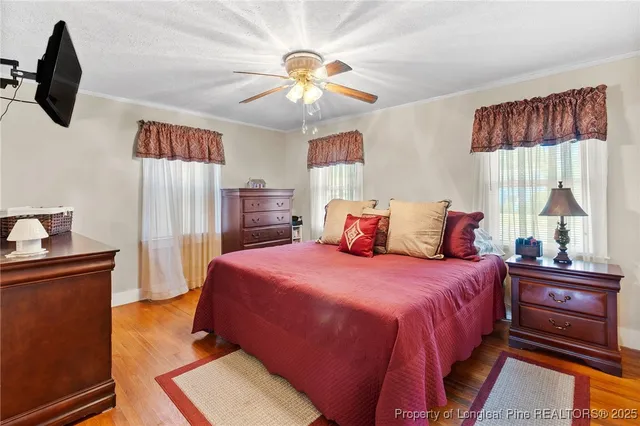 a bedroom with bed and window