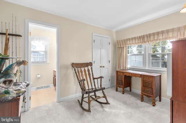 a bathroom with a sink a toilet and vanity