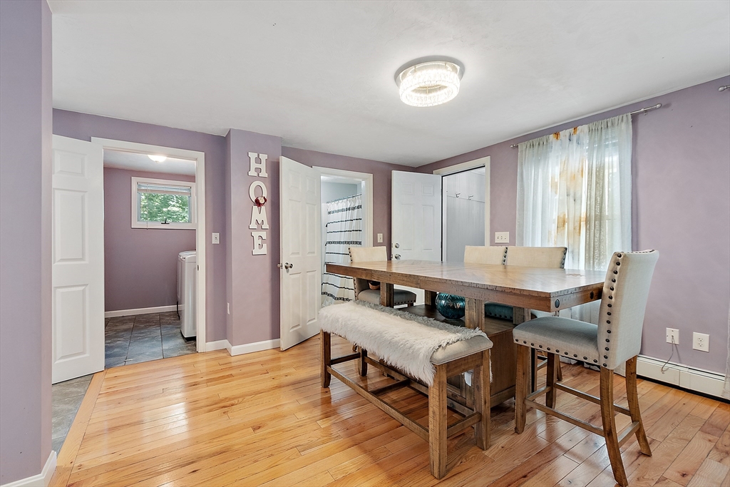 506 Pleasant Street Gardner, MA 01440 - Photo 17 of 41 a living room with furniture and a wooden floor