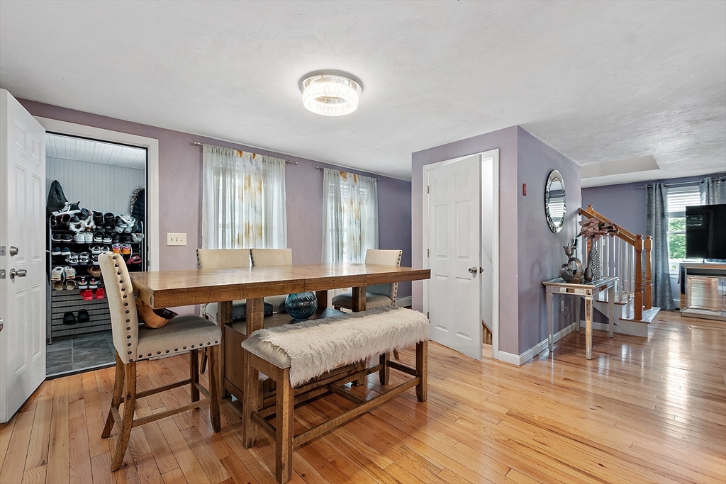 506 Pleasant Street Gardner, MA 01440 - Photo 18 of 41 a living room with furniture and wooden floor