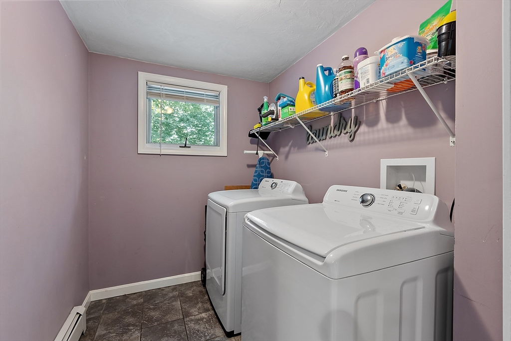 506 Pleasant Street Gardner, MA 01440 - Photo 19 of 41 a utility room with dryer and washer
