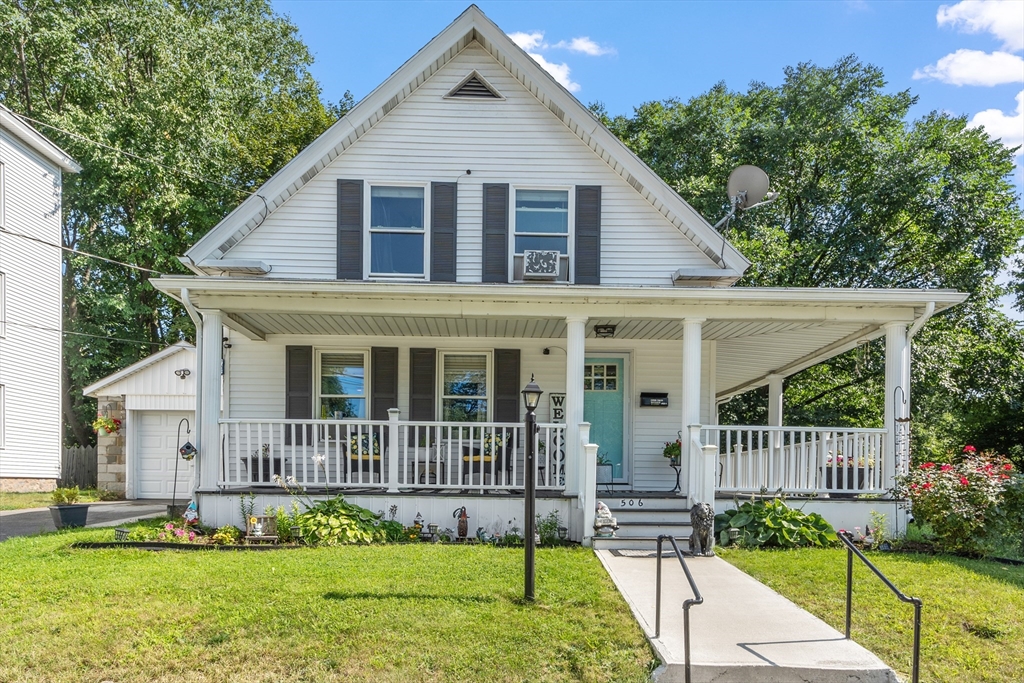 506 Pleasant Street Gardner, MA 01440 - Photo 2 of 41 a view of a house with a yard and plants