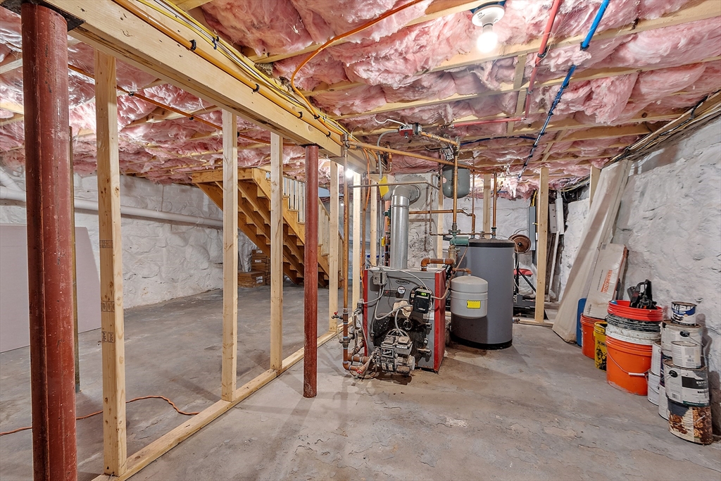 506 Pleasant Street Gardner, MA 01440 - Photo 37 of 41 a view of a storage room with a lot of stuff