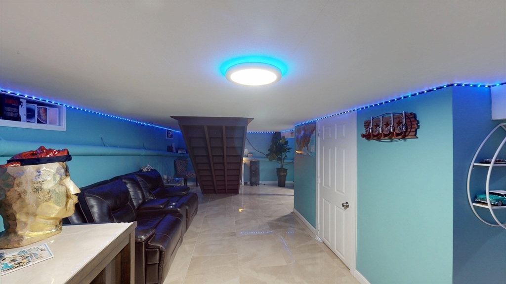 506 Pleasant Street Gardner, MA 01440 - Photo 41 of 41 a living room with furniture and a fireplace