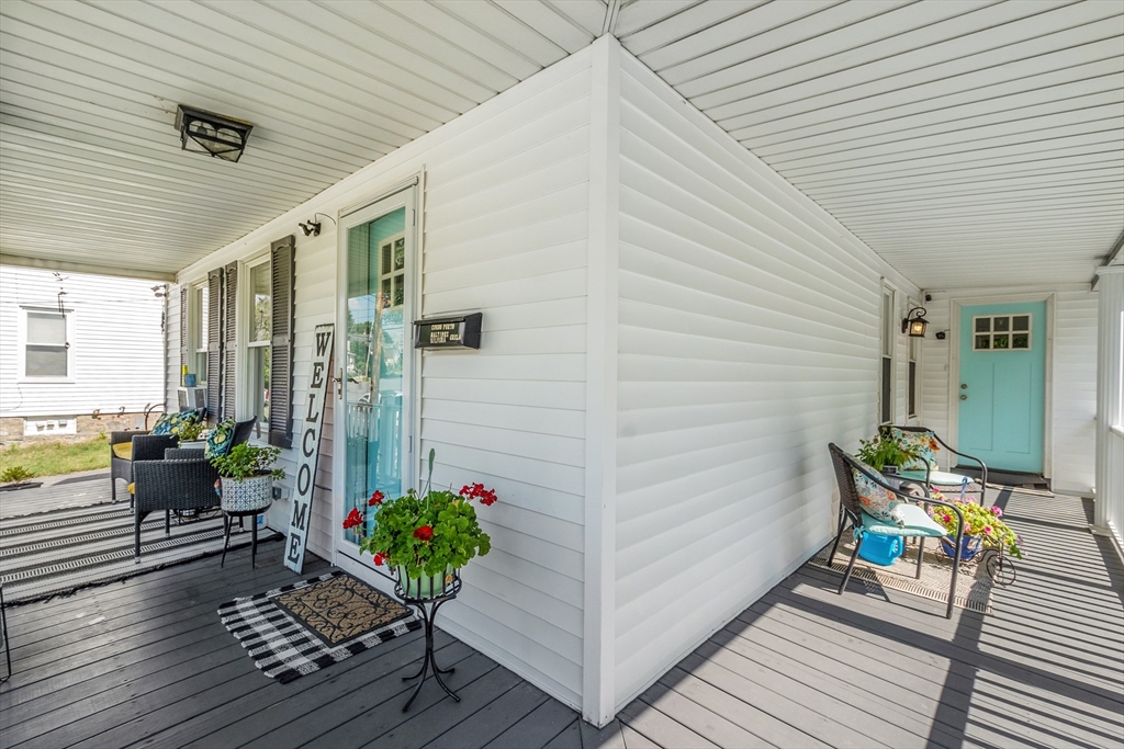 506 Pleasant Street Gardner, MA 01440 - Photo 5 of 41 a house view with a seating space