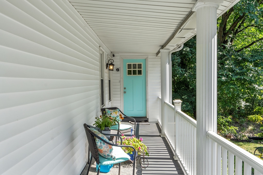 506 Pleasant Street Gardner, MA 01440 - Photo 6 of 41 a view of a porch with furniture