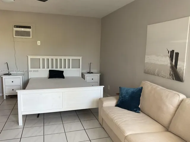 a living room with a couch and a table