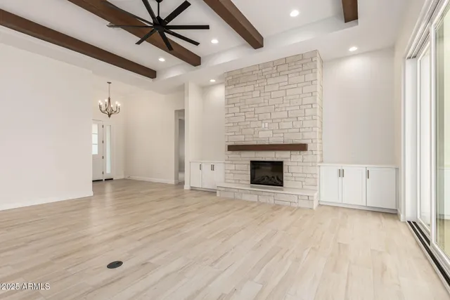 a view of a room with a large window