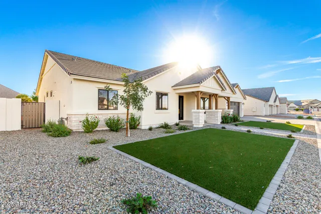 a view of a yard in front of a house