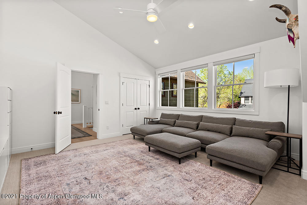 334 Sopris Circle Basalt, CO 81621 - Photo 15 of 34 a living room with furniture and a large window