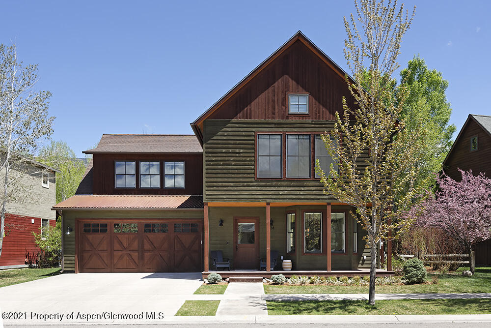 334 Sopris Circle Basalt, CO 81621 - Photo 2 of 34 a front view of a house with a yard