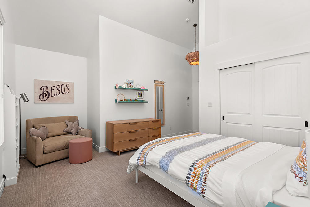 334 Sopris Circle Basalt, CO 81621 - Photo 21 of 34 a bedroom with two bed and a couch