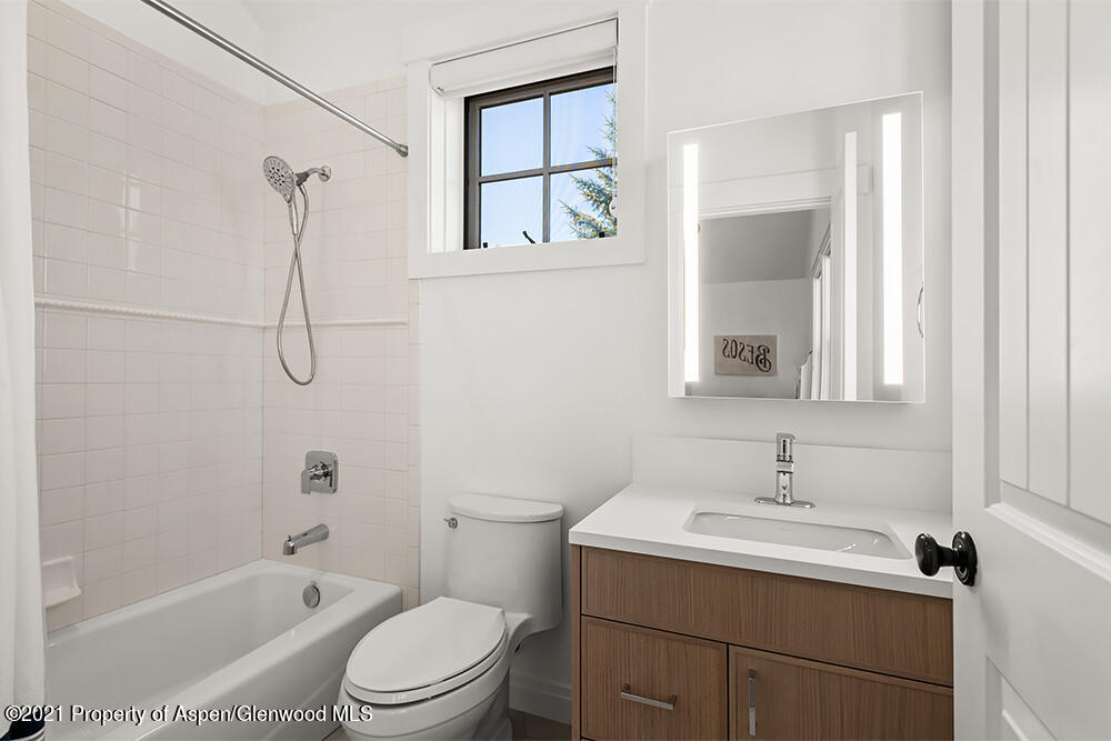 334 Sopris Circle Basalt, CO 81621 - Photo 22 of 34 a bathroom with a sink toilet and shower