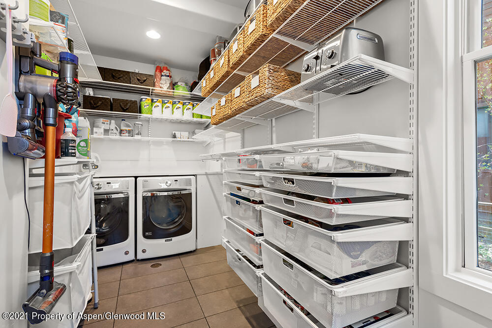 334 Sopris Circle Basalt, CO 81621 - Photo 23 of 34 a utility room with dryer and washer
