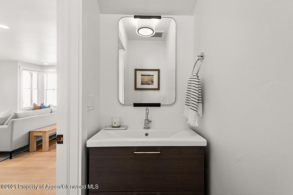334 Sopris Circle Basalt, CO 81621 - Photo 26 of 34 a bathroom with a sink and a mirror
