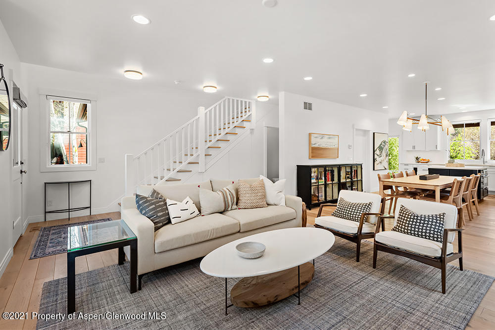334 Sopris Circle Basalt, CO 81621 - Photo 4 of 34 a living room with furniture and a wooden floor